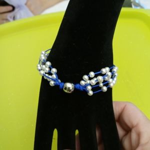 Beautiful blue bracelet with white pearls